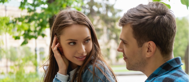 subtle flirting gestures