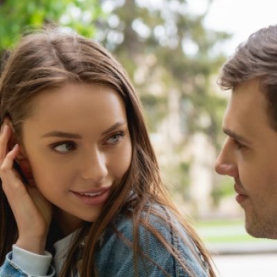 subtle flirting gestures