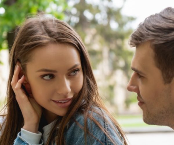 subtle flirting gestures